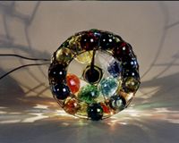 Top of lamp with marbles magnified